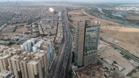 Drone over Busy highway with highrises in Karachi, Pakistan Stock Footage 109083115