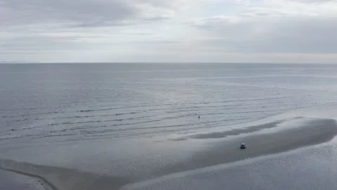 Drone over Car on Beach Stockbeeldmateriaal 158509480