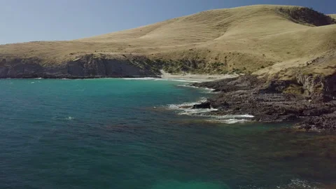 Drone over cliff and Pacific Ocean, blue waters, Australia, SA, Blowhole Beach Stock Footage 236365063