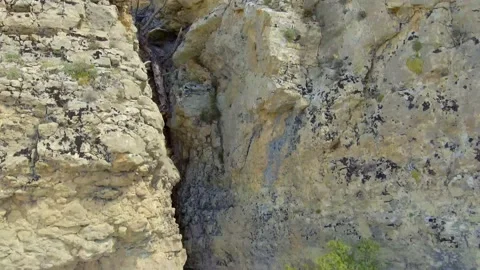 Drone over a cliff. The road at the end of the world. Split mountain. The end of Stock Footage 130194545