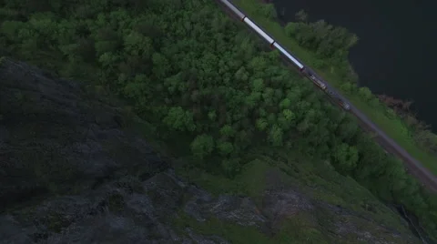 Drone over cliff with train Vídeos de archivo 64640720