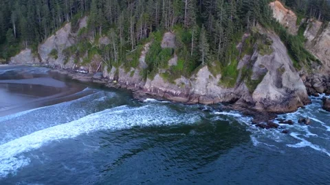 Drone over Coastal Cliffs and Ocean at Sunset Stock Footage 341366639