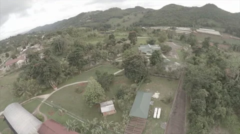 Drone over complex on a cloudy day - Caribbean Stock Footage 62528863