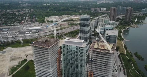 Drone Over Condo With Crane Stock Footage 141981387
