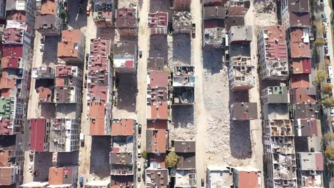 Drone Over Densely Built Urban Area with Slums and Ruins Stock Footage 311869617
