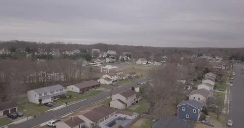 Drone over development overcast winter Stockbeeldmateriaal 99206960