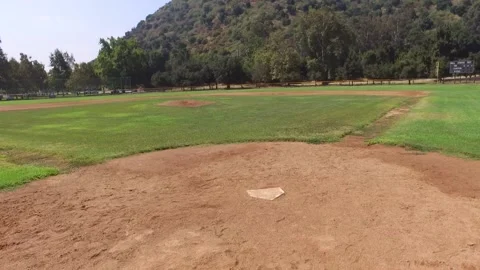 Drone over empty baseball field, baseball diamond Video stock 136561492