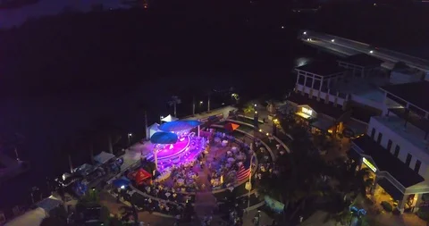 Drone over Evening Event at a Waterfront Venue Stock Footage 118925090