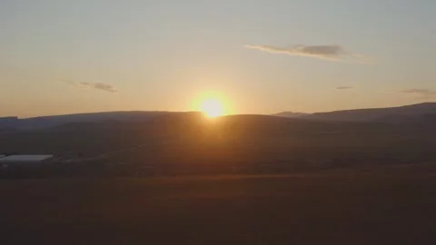 Drone over a field sunset 스톡 동영상 254582034