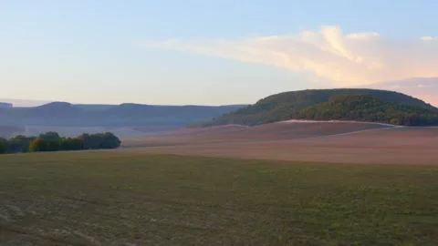 Drone over a field sunset 스톡 동영상 254685163