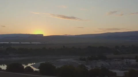 Drone over a field sunset 스톡 동영상 258640291