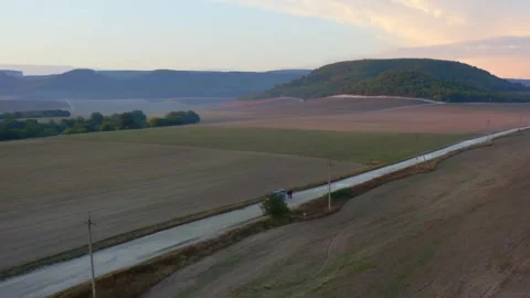 Drone over a field sunset 스톡 동영상 267494029