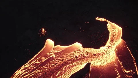 Drone Over Flowing River Of Molten Lava From Erupting Volcano Video stock 168770942