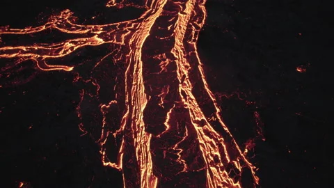 Drone Over Flowing River Of Molten Lava From Erupting Volcano Video stock 168771310
