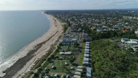 Drone over foreshore and sandy beach Adelaide 4k Stock Footage 280379211