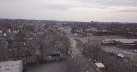 Drone over Garfield NJ train tracks car 스톡 동영상 102772803