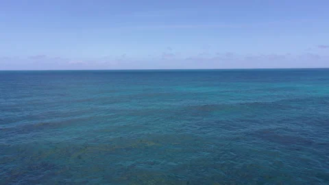 Drone over gentle ocean waves 4k Stock Footage 155770261