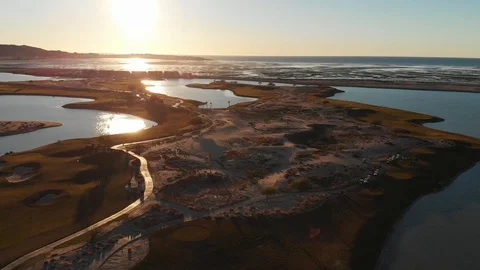 Drone over Golf Course on the Ocean with Reflection Vidéo 115056067
