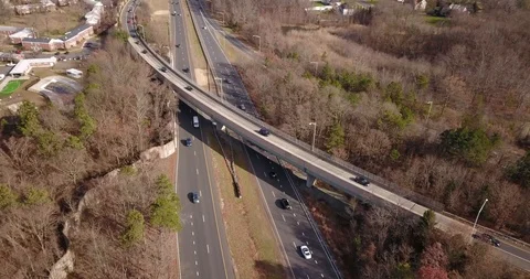Drone over highway overpass fall winter 動画素材 121071787