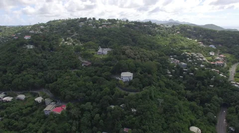Drone over homes in mountain forest Stock Footage 63453824