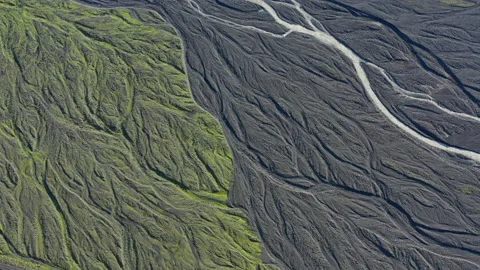 Drone Over Landscape With Dry Riverbed Of Braided River Video stock 168775911