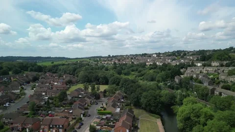 Drone over Maidstone rooftops and treelined streets in Kent Video stock 310601060