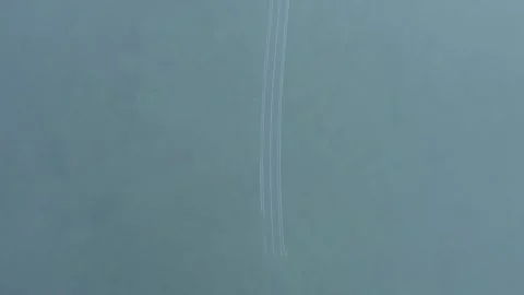 A drone over a mountain road in dense forest and fog. Cloudy summer day Stock Footage 279132763