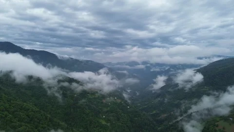 Drone Over Mountain Valley With Vast Cloud Cover in Distance, Georgia 스톡 동영상 337333601