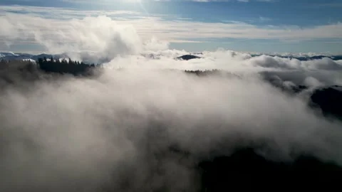 Drone over mountains and clouds Stock Footage 243593697