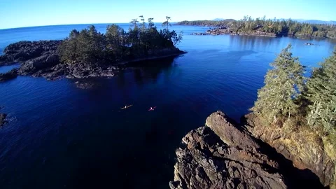 Drone Over Ocean Cliffs and Kayakers Video stock 144149078