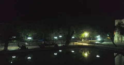 Drone over the pool at night in front of the complex Bolo Haouz Mosque. Stock Footage 271172752