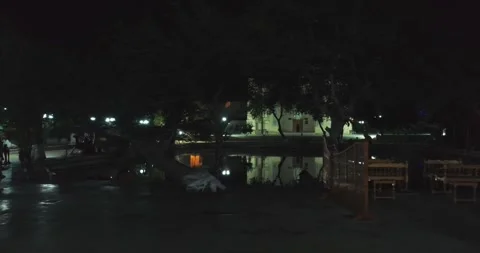 Drone over the pool at night in front of the complex Bolo Haouz Mosque. Stock Footage 310498521