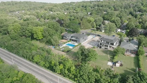 Drone over property with pool Stock Footage 229562793