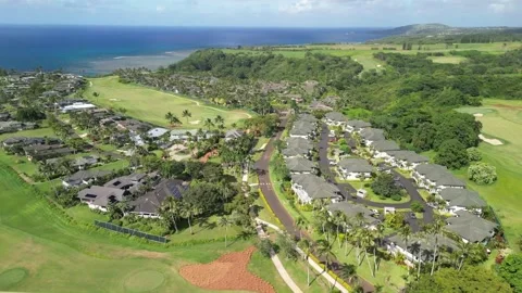 Drone over Queen Emmas Bluff section of Princeville, Kauai, Hawaii, part 3 Stock Footage 299965743