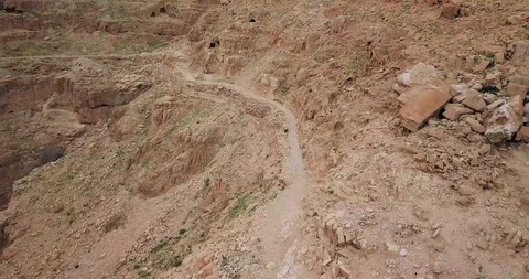 Drone over the road between Jericho and Jerusalem. Video stock 125114863