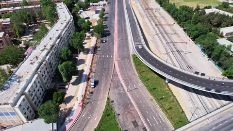 Drone over a road bridge with passing cars Stock Footage 311805974