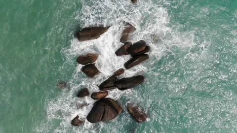 Drone is over a rocky beach Stock Footage 194446132