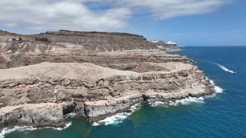 Drone Over Rocky Coastline with Cliffs and Crashing Waves – Gran Canaria Stock Footage 309951037