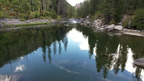 Drone Over Rocky River Calm Mirror Washington State Pacific Northwest Fores.. Stock Footage 345276796