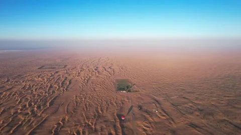 A drone over the sand dunes of the desert in Dubai. A sunny summer day, a Stock Footage 278866732