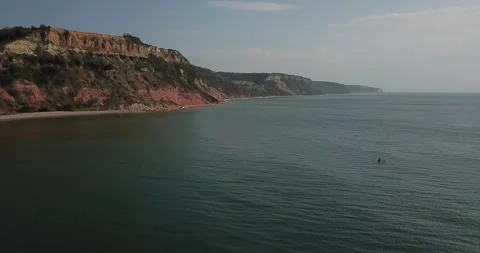 Drone over sea Cornish pilot gig rowing boat (Jurassic Coast) Stock Footage 139622196