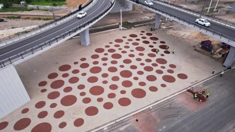 A drone over a section of the city's asphalt road during repairs. Sunny summer Stock Footage 335461358