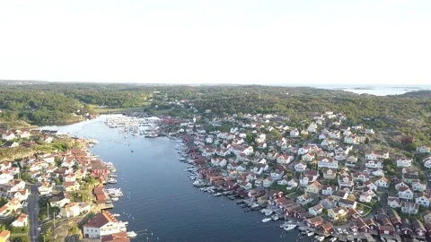DRONE OVER SMALL SWEDISH WESTCOAST TOWN BY THE SEA Stock Footage