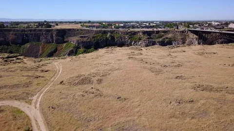 Drone over snake river edge of ravine tall bridge Idaho Stock Footage 91917519