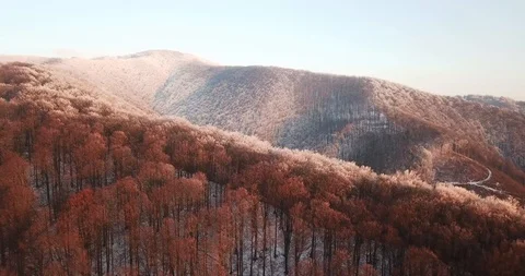 Drone over the snow capped mountains between 4k Stock Footage 123611127