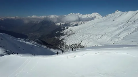 Drone over the snow-covered mountains Stock Footage 323841868
