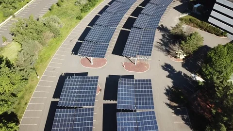 Drone over solar large solar panels next to building 動画素材 111400242