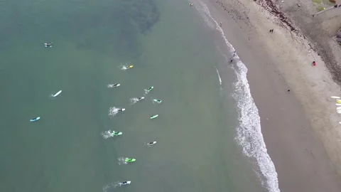 Drone Over Surfers At California Beach (1 of 2) Stockbeeldmateriaal 166319696