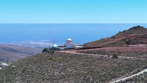 Drone over Temisas Observatory with view toward blue Atlantic Ocean Stock Footage 310683598
