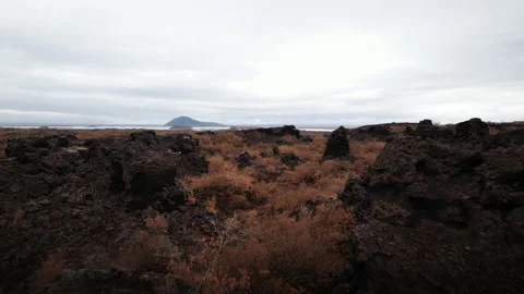 Drone over volcanic rocks and terrain of Dimmuborgir Stock Footage 166498501
